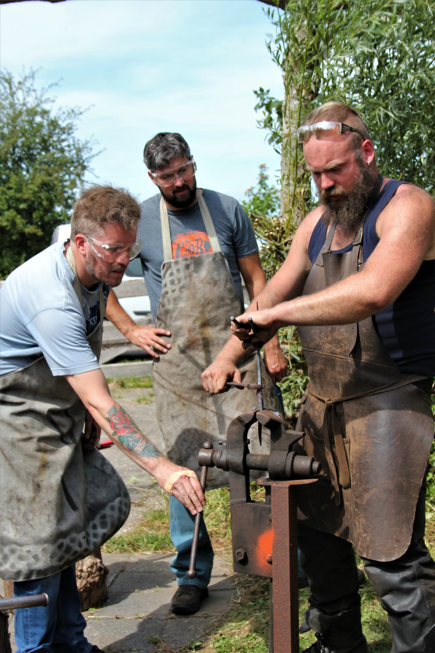 torderen tijdens workshop smeden